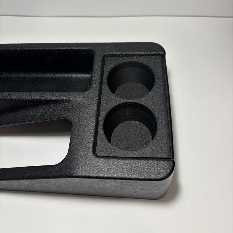 BMW E36 Rear Dual Cupholder v2 placed on table, angled