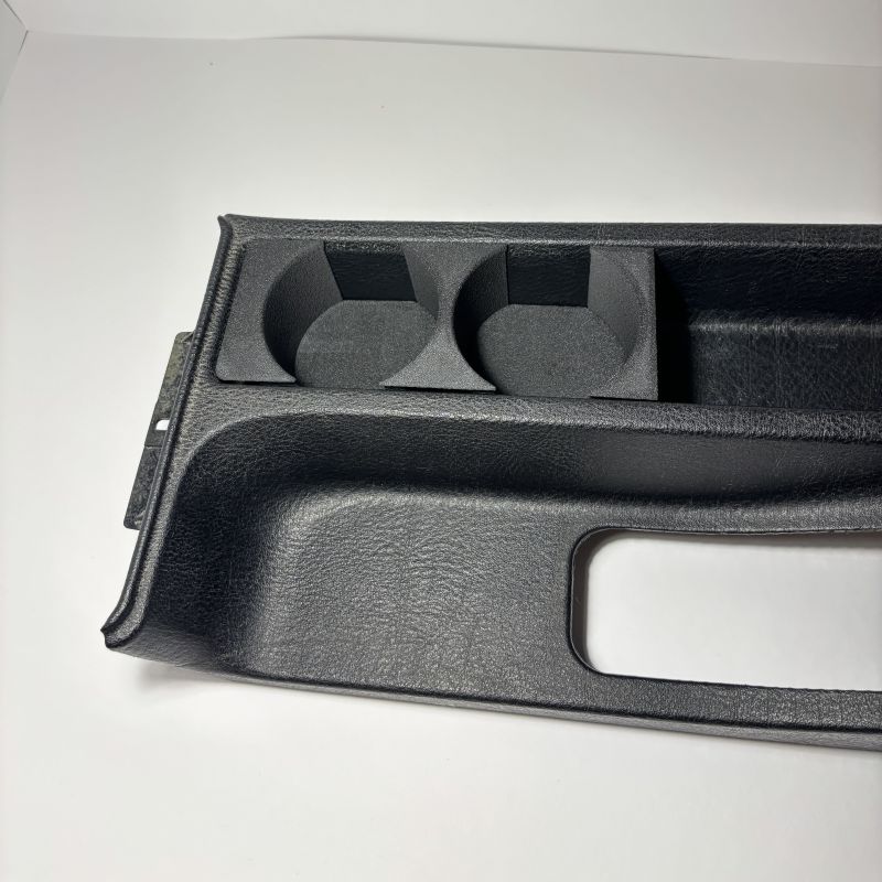 BMW E36 Front Dual Cupholder v2 placed on table