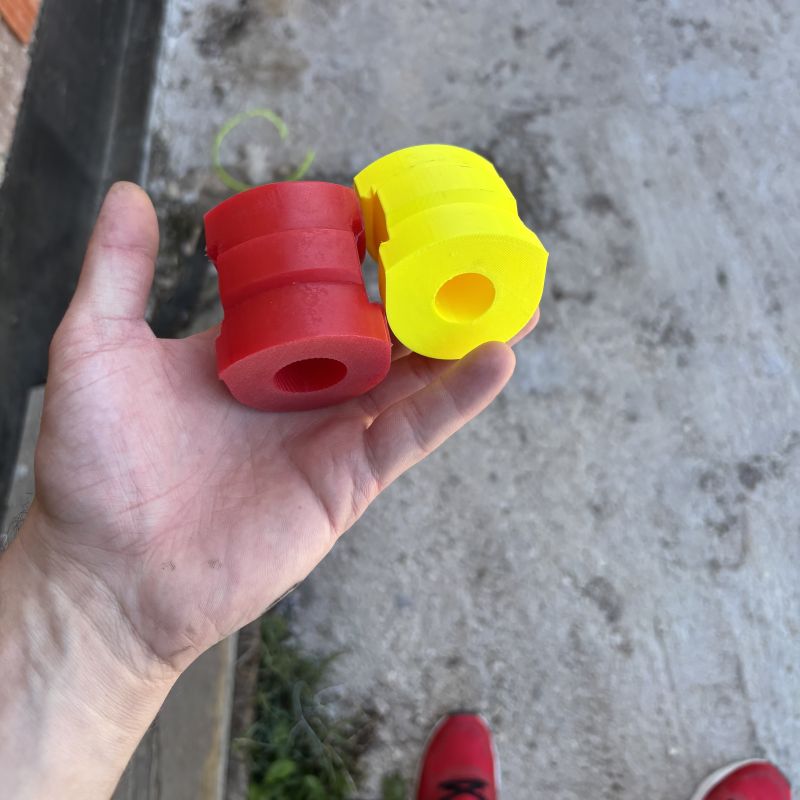 BMW E36/E46 Race Sway Bar Bushings shown in hand