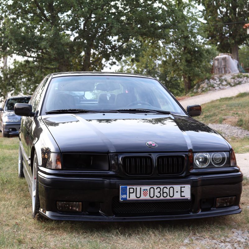 BMW E36 Headlight Air Intake installed, full car front view