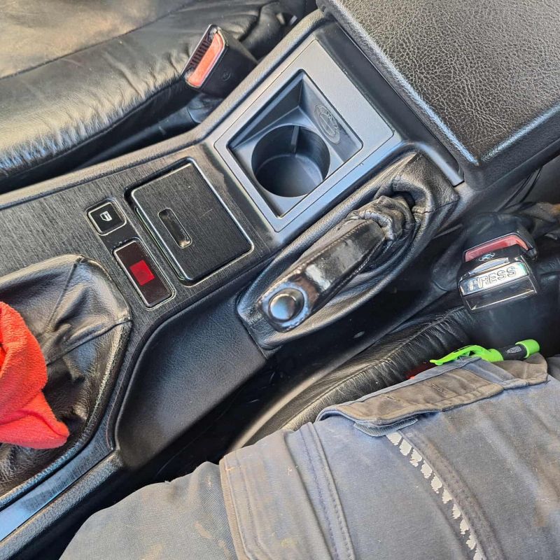 BMW E39 Cupholder installed, closeup view